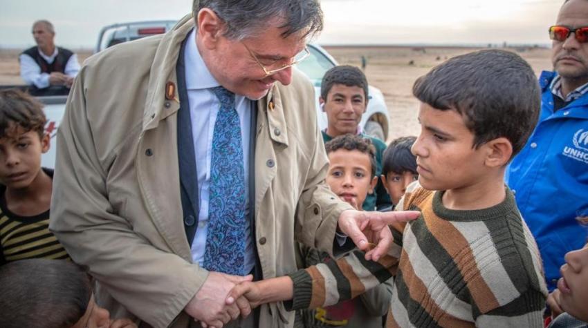 At Salamiya IDP camp near Mosul, Iraq, Bruno Geddo consoles a boy who was harassed by his peers due to a disability. The photo was taken in July 2018, just days after the city’s liberation. ©Courtesy of Bruno Geddo
