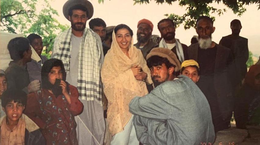 While visiting Afghanistan in May 2002, Shahrzad Tadjbakhsh engages with members of the local community. At the time, she was working for the Office of the UN High Commissioner for Human Rights and travelled frequently to Afghanistan.