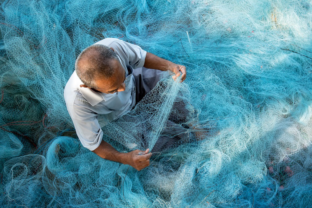 man with fishing net seen from above